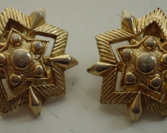 Pair of Clip On metal earrings