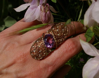Lace ring of white gold , amethyst and white pearls